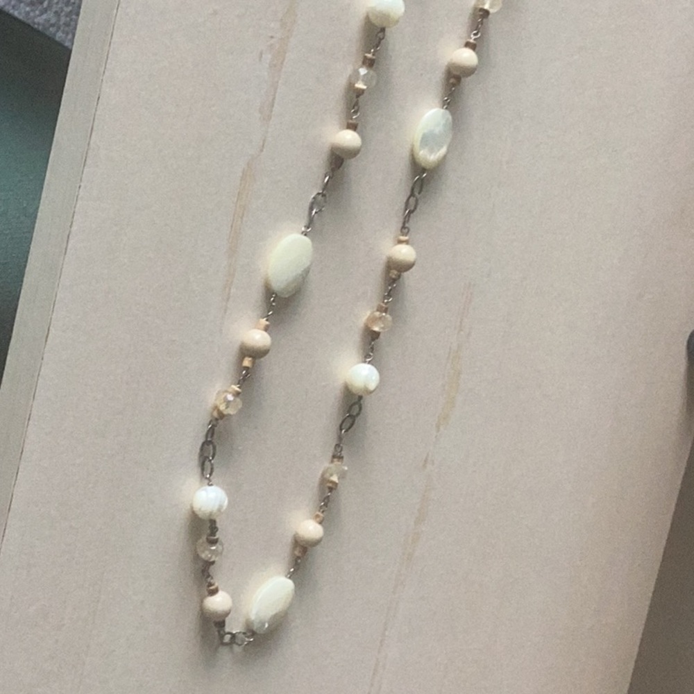 Sterling silver necklace with brown and cream accents